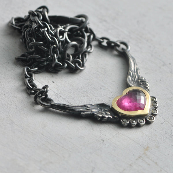 flying heart necklace in 14k gold and pink tourmaline