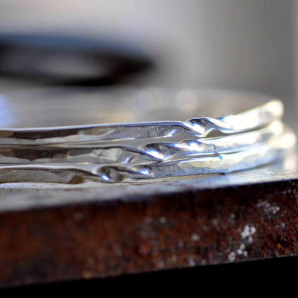 twisted bangle in sterling silver or 14k gold