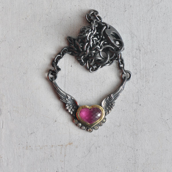 flying heart necklace in 14k gold and pink tourmaline