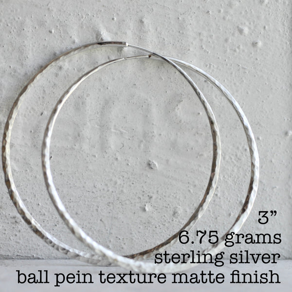 endless hoop earring with ball pein texture and matte finish