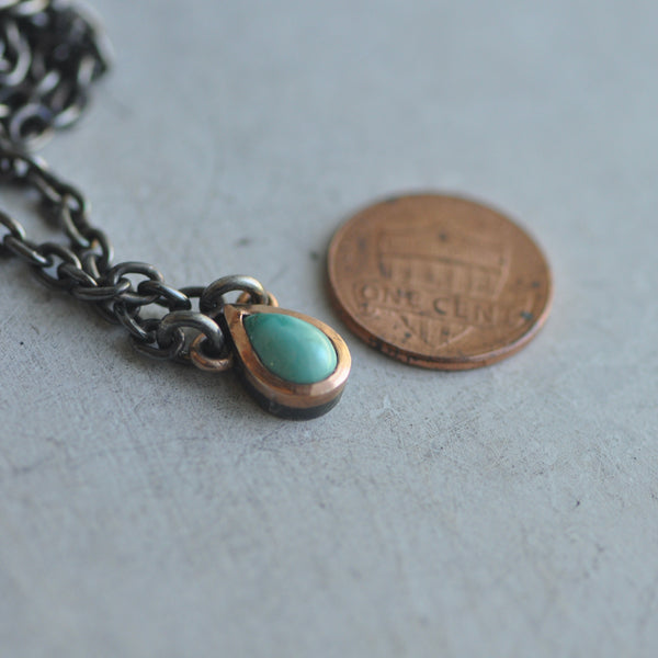 Variscite stone necklace with rose gold frame on dark sterling