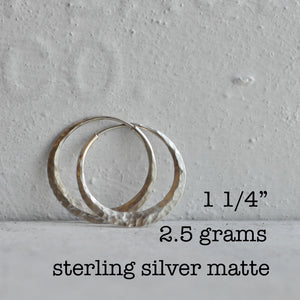 endless hoop earring with ball pein texture and matte finish