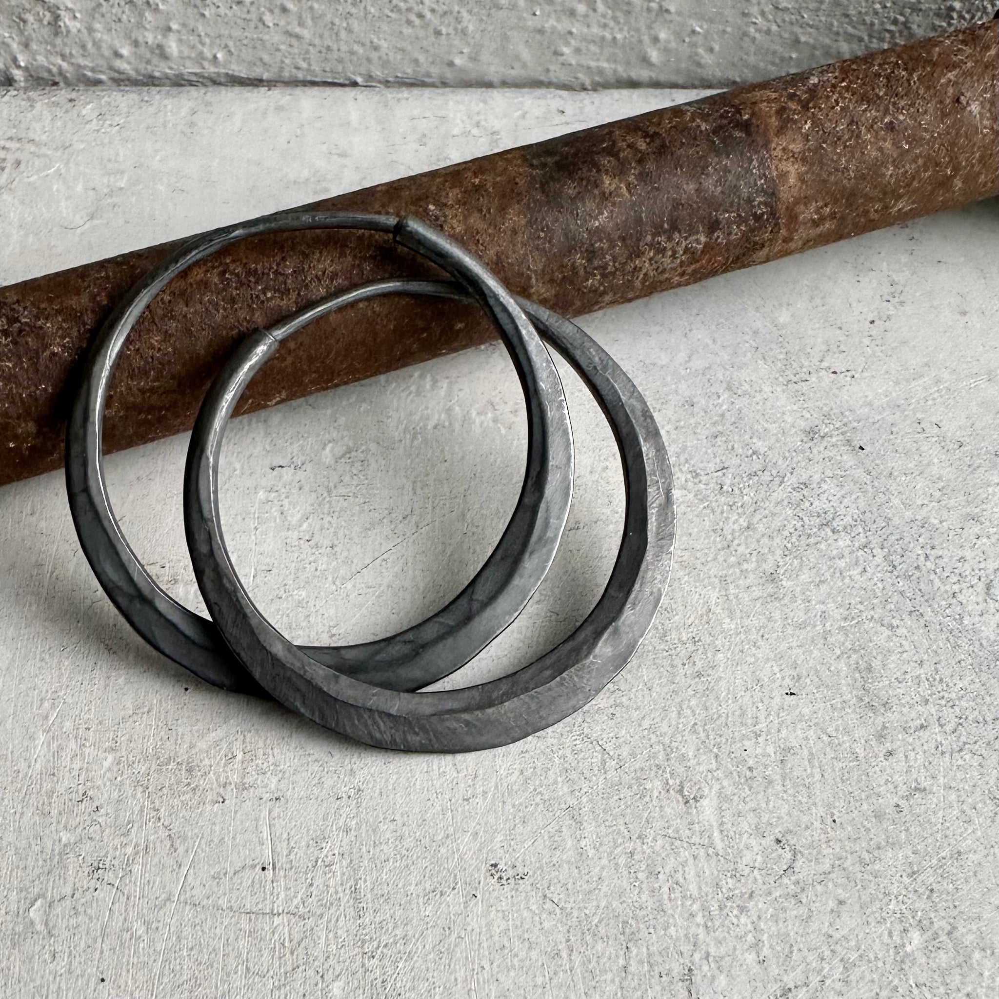 hoop earrings in dark sterling silver