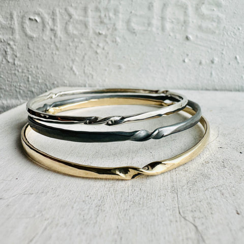twisted bangle in sterling silver or 14k gold
