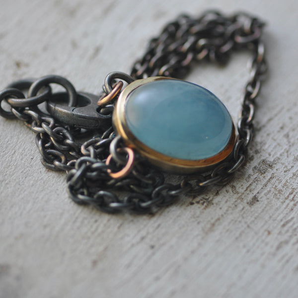 cats eye aquamarine pendant in sterling silver and 14k gold