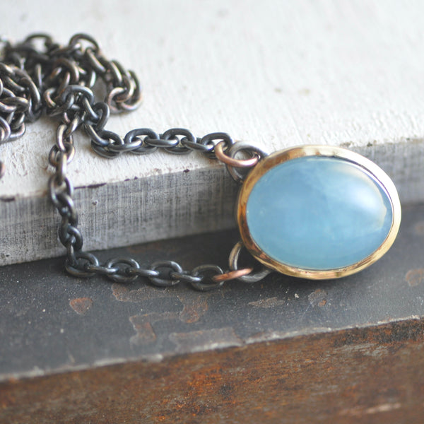 cats eye aquamarine pendant in sterling silver and 14k gold