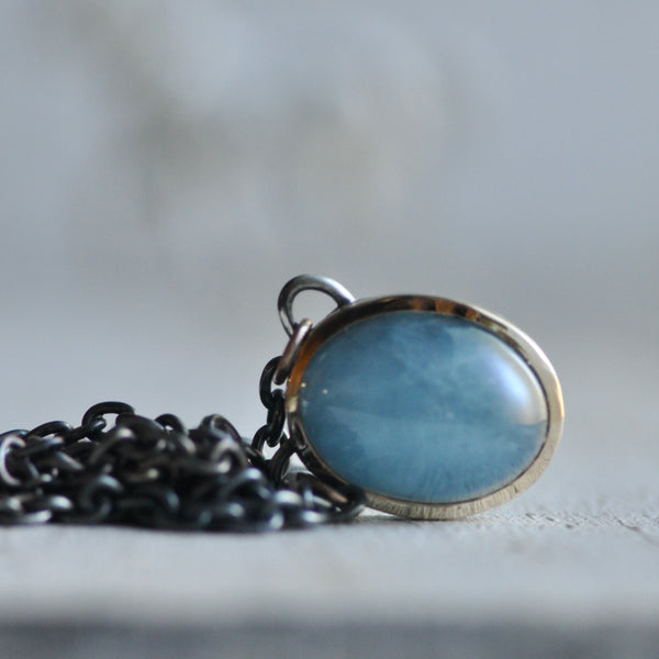 cats eye aquamarine pendant in sterling silver and 14k gold